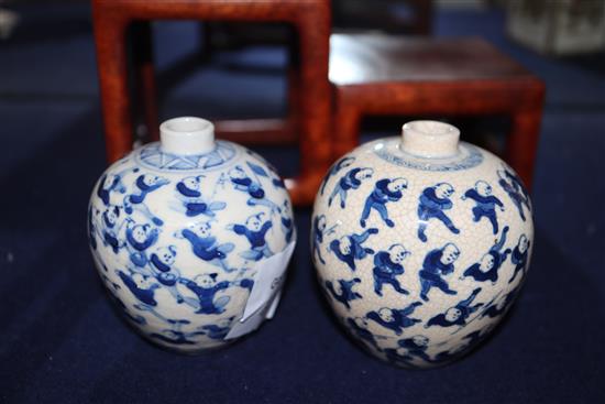 Two Chinese crackleglaze small blue and white vases, painted with figures, late 19th century plus wood scholars stand, tallest 7cm